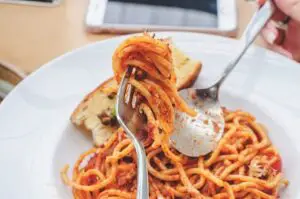 spaghetti with spoon and fork