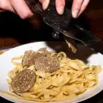 preparing pasta with truffles